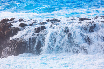 Ocean waves over rocks