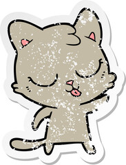 distressed sticker of a cartoon hissing cat