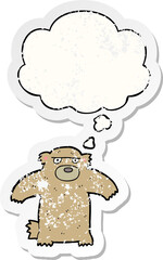 cartoon bear and thought bubble as a distressed worn sticker
