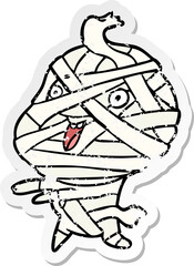 distressed sticker of a cartoon halloween mummy