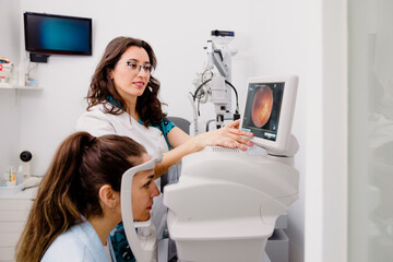 Female optometrist checking patients eyesight