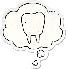 cartoon tooth and thought bubble as a distressed worn sticker