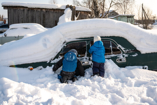 cleaning snow off after snow storm