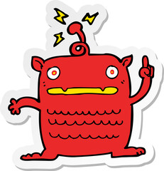 sticker of a cartoon weird little alien