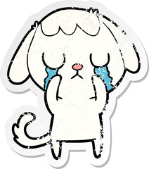 distressed sticker of a cute cartoon dog crying