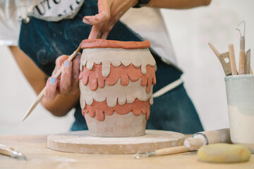  Modeling of a creative and youthful ceramic piece of pottery