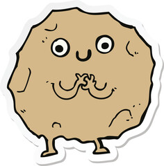 sticker of a cartoon rock character