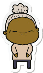 sticker of a cartoon peaceful old woman