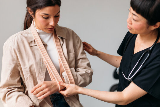 Female Doctor Examining Young Woman