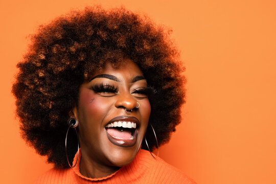 Smiling black woman with afro hair