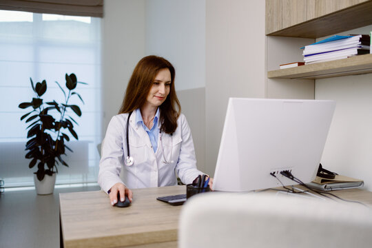 Clinician hospital office pc profession busy technology