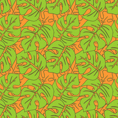 seamless asymmetric pattern of green tropical leaves on a red background, texture, design