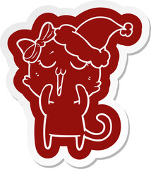 cartoon  sticker of a cat wearing santa hat