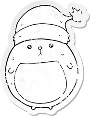 distressed sticker of a cute cartoon christmas bear