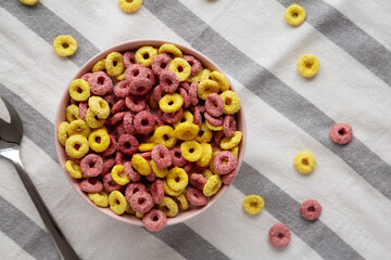 Colorful Cereal Loops with Whole Milk for Breakfast. Flat lay, overhead, from above.