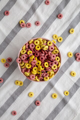 Colorful Cereal Loops with Whole Milk for Breakfast. Flat lay, overhead, from above.