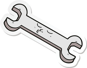 sticker of a cartoon spanner