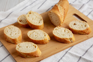 Homemade Sliced Bread on a bamboo board, low angle view. Close-up.