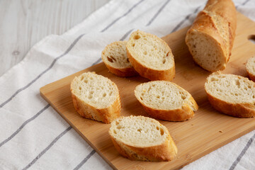 Homemade Sliced Bread on a bamboo board, low angle view.