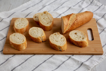 Homemade Sliced Bread on a bamboo board, low angle view.