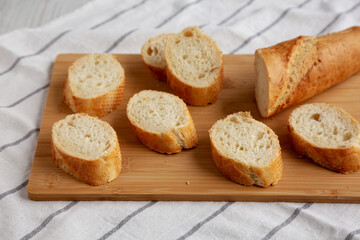 Homemade Sliced Bread on a bamboo board, low angle view.