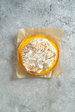 Lemon custard cake on grey background