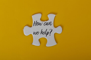 White jigsaw puzzle written with HOW CAN WE HELP?