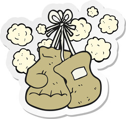 sticker of a cartoon boxing old gloves