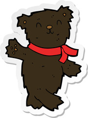 sticker of a cartoon waving teddy black bear