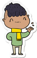 sticker of a cartoon friendly boy