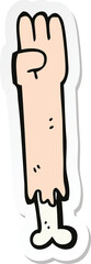 sticker of a cartoon zombie arm