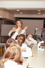 Elementary school children doing experiments in the laboratory