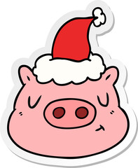 sticker cartoon of a pig face wearing santa hat