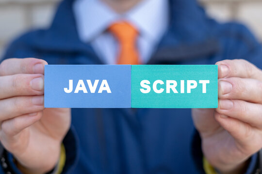 Man holding colorful styrofoam blocks with inscription: JAVA SCRIPT. Concept of java programming language. Web development software technology.