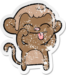distressed sticker of a funny cartoon monkey