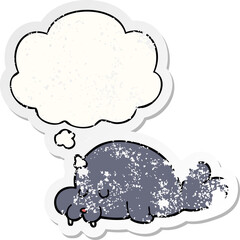 cartoon walrus and thought bubble as a distressed worn sticker