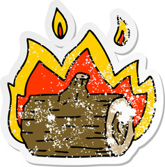 distressed sticker of a quirky hand drawn cartoon campfire