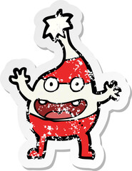 retro distressed sticker of a cartoon funny christmas creature