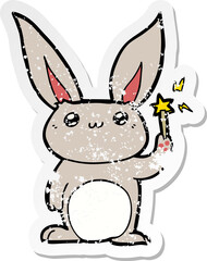distressed sticker of a cute cartoon rabbit