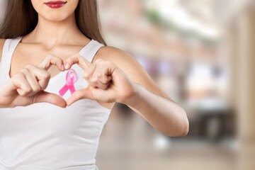 Cancer awareness concept, woman with pink ribbon