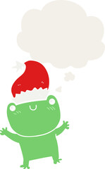 cute cartoon frog wearing christmas hat and thought bubble in retro style