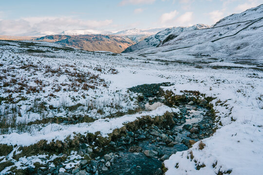 Hause Gill and snow on Seatoller Fell