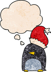 cute christmas penguin and thought bubble in grunge texture pattern style