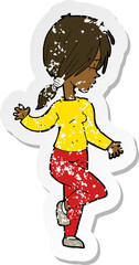 retro distressed sticker of a cartoon girl dancing