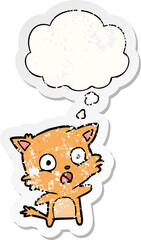 cartoon cat and thought bubble as a distressed worn sticker