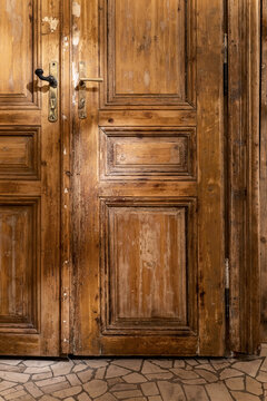 Vintage wood double door inside grunge apartment