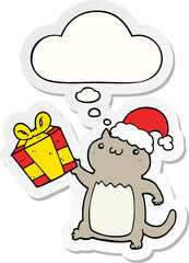 cute cartoon christmas cat and thought bubble as a printed sticker