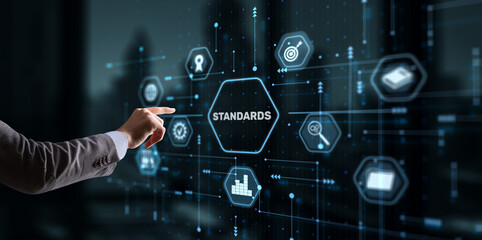 Businessman clicks Standards Quality assurance and control concept