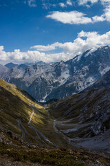 Fototapeta na wymiar Mountain scenic road Stelvio Pass in Alps