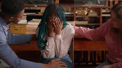 African American woman crying in therapy.